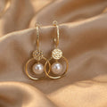 Earrings with Cultured Pearls and Embellished Spheres