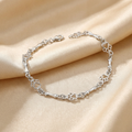 Limited Edition Pure Silver Dog Paw and Bone Charm Bracelet