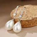 Dangling Earrings with Radiant Pearls