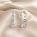 Round Cut Moissanite Earrings in White Gold